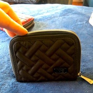 Lug small zip around wallet